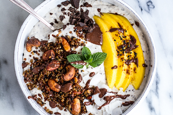 Coconut Banana Oats Bowl with Crunchy Black Sesame Quinoa Cereal + Mango. Recipe at Half Baked Harvest.